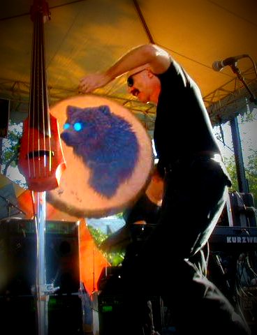 Tony Levin playing a drum