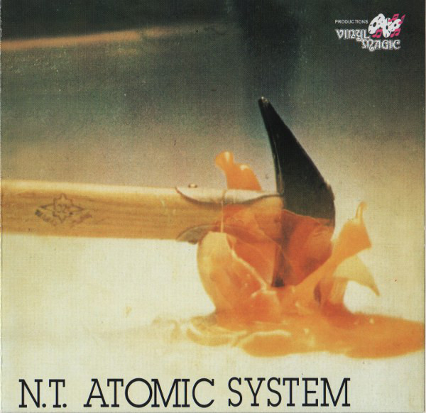 N.T. — Atomic System